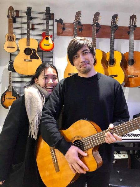 Andre and Jacquelin with a Katoh cutaway semi acoustic classical guitar