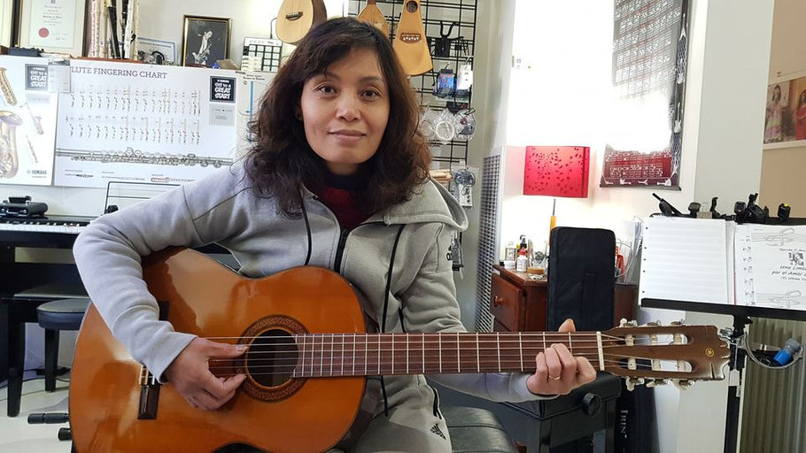 Another happy customer Anh.  Yamaha G-235 Custom Electric Classical Guitar