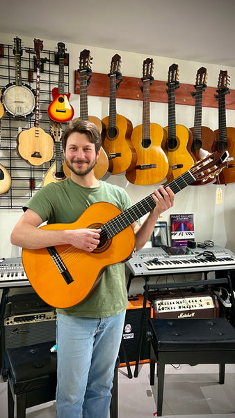 Tebs with his new baby a Morris M-20 custom electric classical guitar