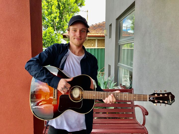 Lachlan with an Epiphone EL-00 PRO. Lachlan is a guitar builder. He sure can recognize a good quality instrument.