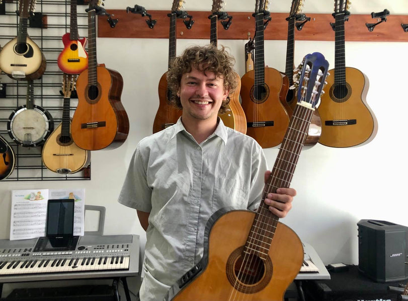 Mitchell with a top of the range Barclay no.350 electric classical guitar (1965)