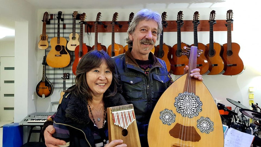 Happy customers.  Olly and Haruko with their favourite instruments.